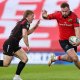 Munster hold off strong challenge by Lions